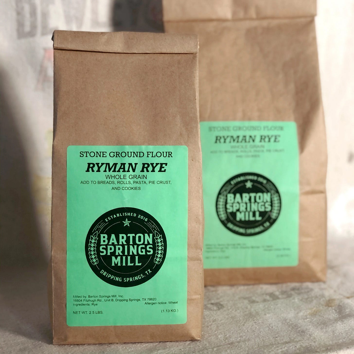 Two bags of ryman rye, a whole grain stone ground flour