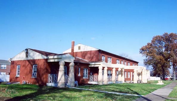 Brick apartment building repurposed as a cultural museum