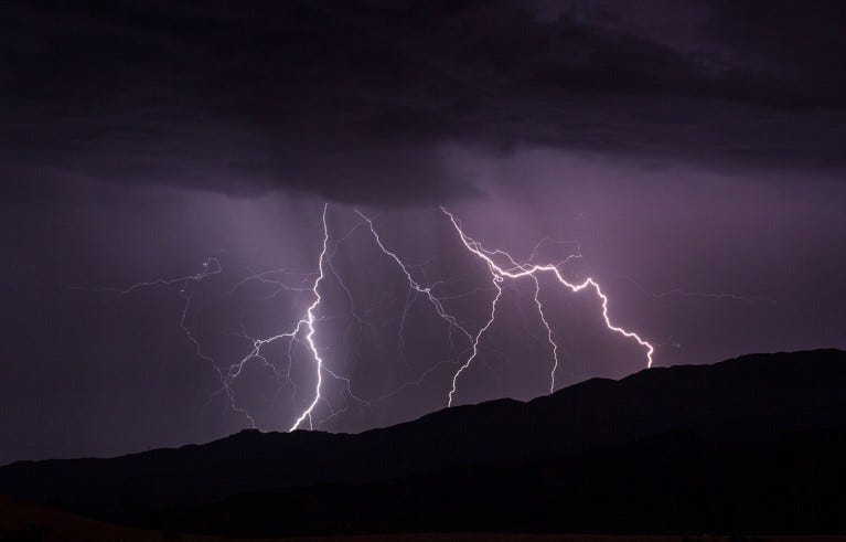 Lightning strikes pictured during a fast-moving tropical thunderstorm that rolled across Santa Barbara County's Wine Country.