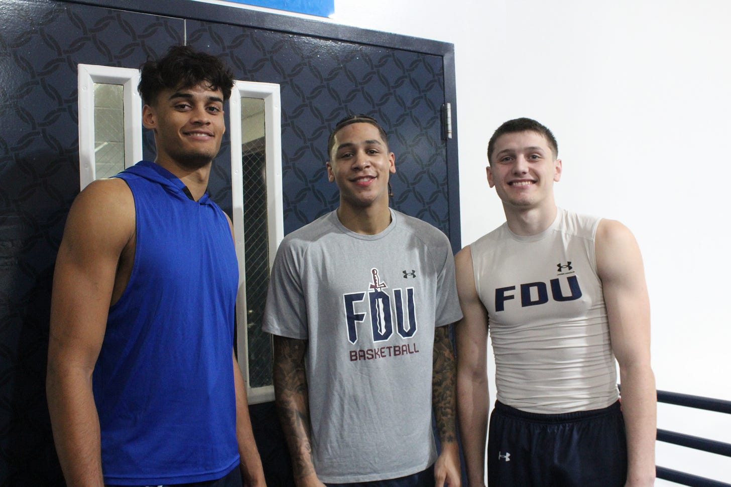 From left to right: Jo’el Emanuel, Terrence Brown and Brayden Reynolds prepare for the 2024-25 season at FDU. (Photo by Adam Zielonka)