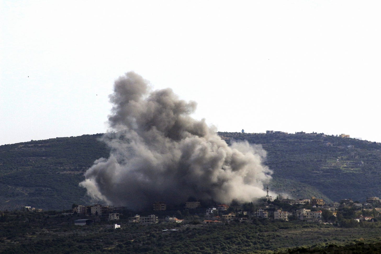 PHOTO: Smoke billows over the southern Lebanese village of Shihine on the border with Israel during an Israeli air strike on Jan. 22, 2024.