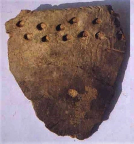 Xianrendong cave pottery fragment, radiocarbon dated to c. 20,000 BP[3]