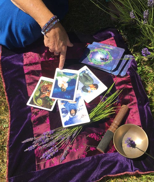 Joanna reading the Gaian Tarot