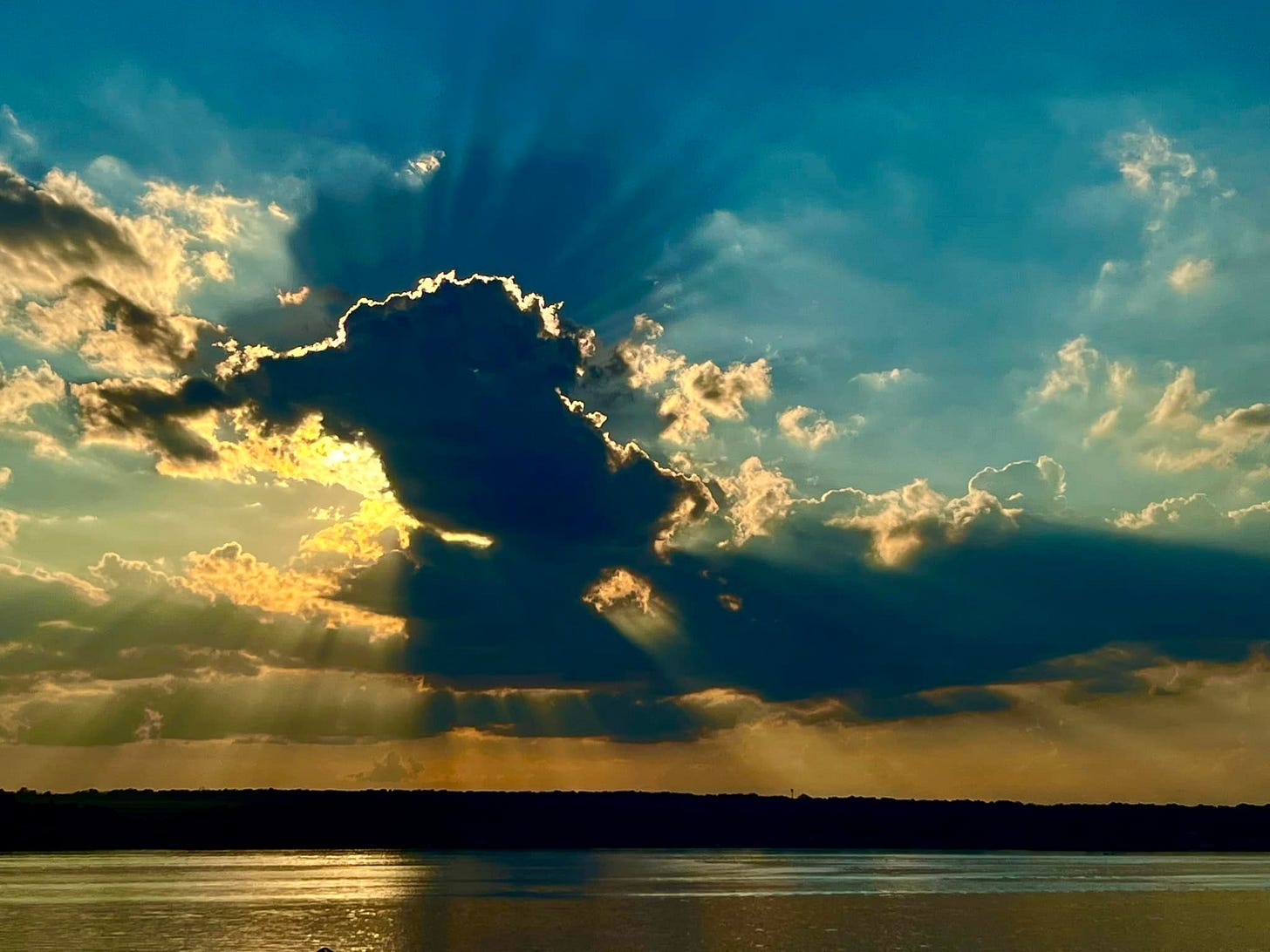 May be an image of cloud and twilight May be an image of cloud and twilight
