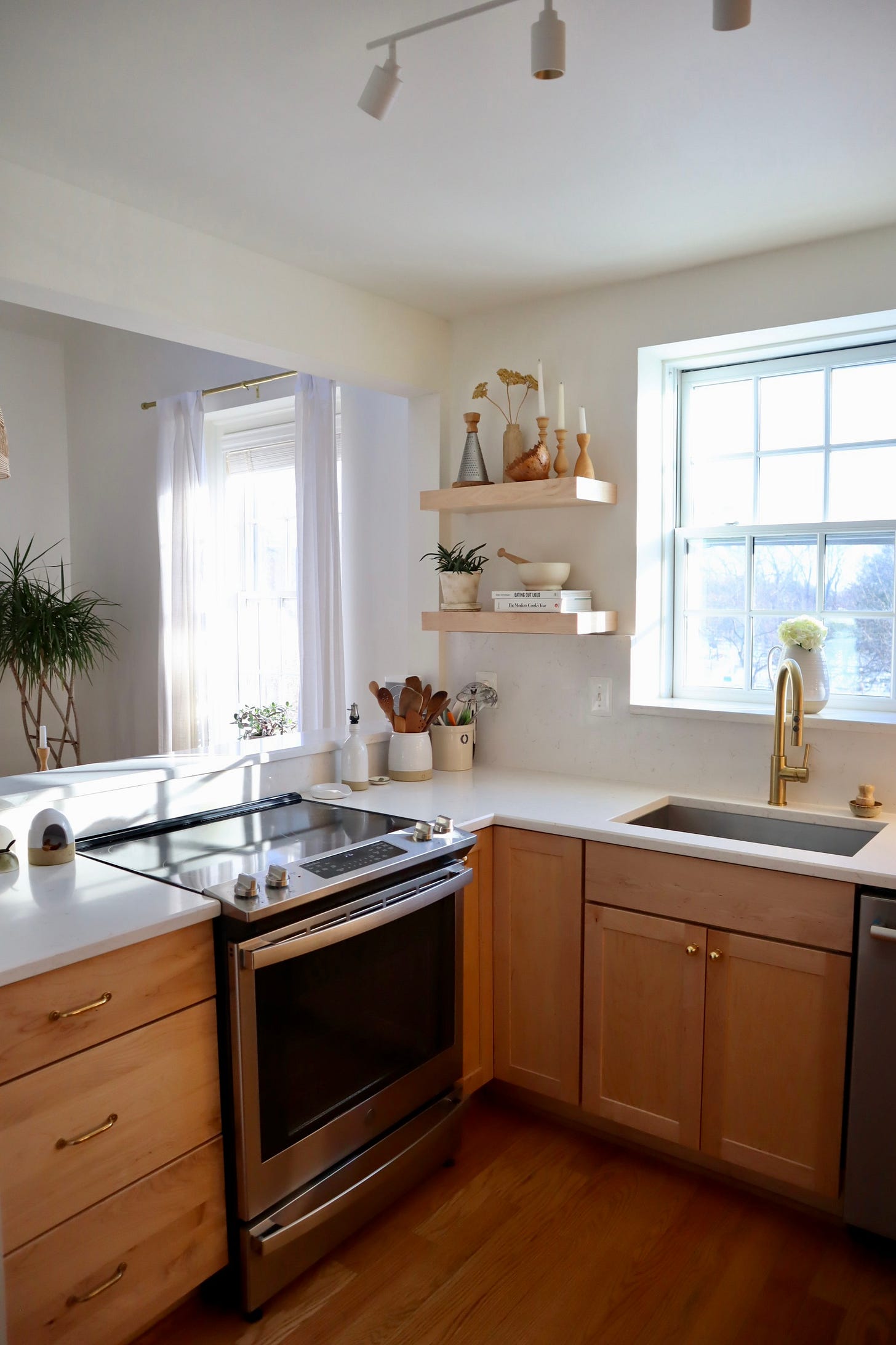 image of kitchen with bright light and open shelving