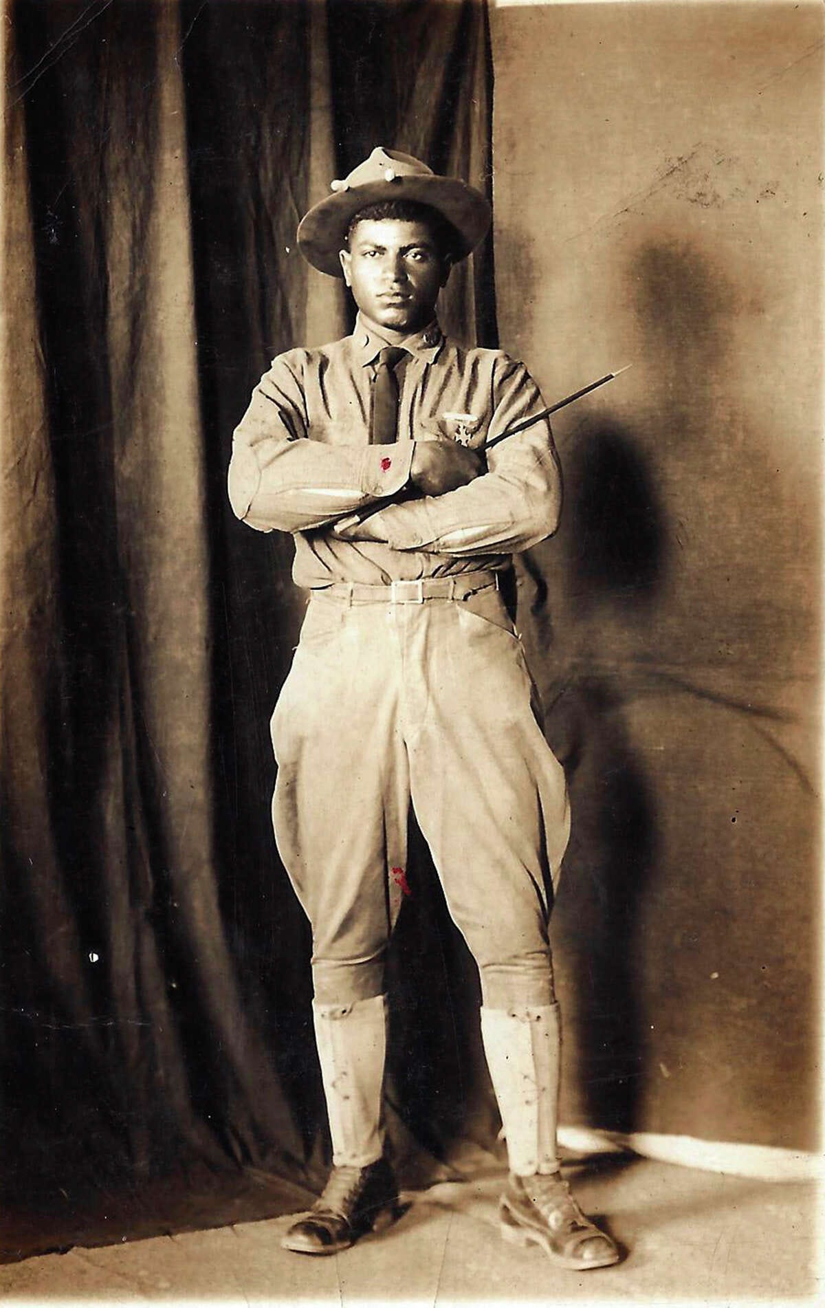 Pvt. Thomas C. Hawkins stands in his World War I uniform. Among the 13 soldiers executed on Dec. 11, 1917, he wrote his parents, 'When this letter reaches you, I will be beyond the veil of sorrow. I will be in heaven with the angels.' Photo courtesy of the U.S. Army