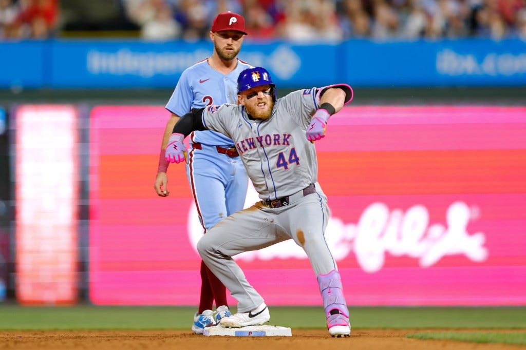 Harrison Bader celebrates after advancing to second base after his RBI single in the eighth inning of the Mets' win.