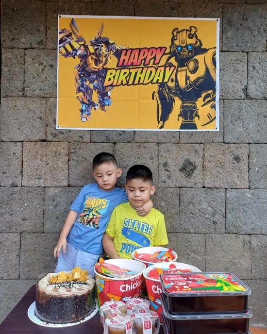 Miguel and Rafa eating Jollibee