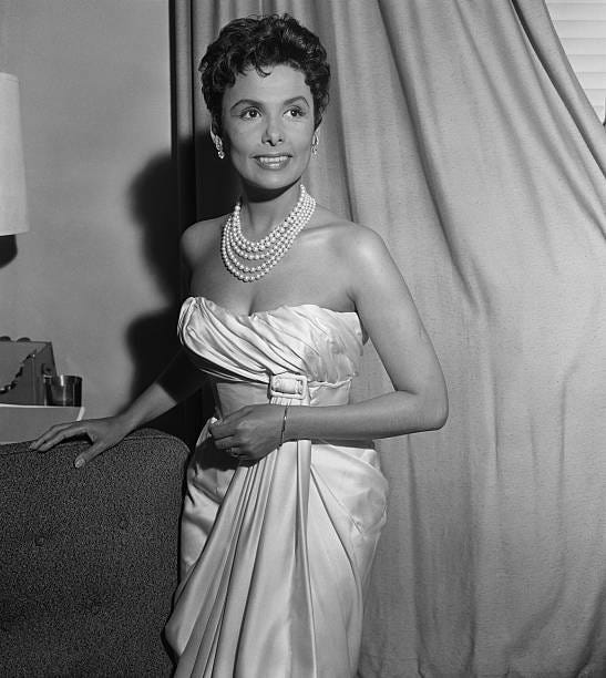 Singer Lena Horne prepares for her appearance at the Cocoanut Grove. She plans to make this her last night club appearance before her Broadway debut.