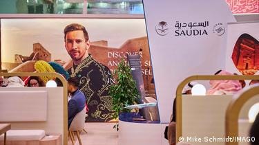 A poster showing footballer Lionel Messi as the advertising icon of Visit Saudi.