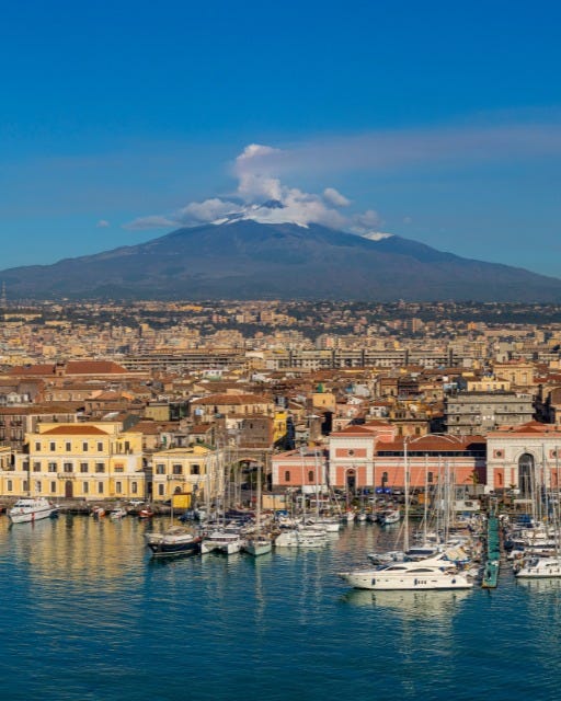 May be an image of the Arno River, Camogli and bell tower