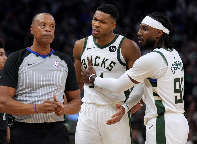 Bucks forward Giannis Antetokounmpo is held back by forward Jae Crowder while arguing a call during the first half of their game against the Detroit Pistons on Wednesday at Fiserv Forum. Bucks forward Giannis Antetokounmpo is held back by forward Jae Crowder while arguing a call during the first half of their game against the Detroit Pistons on Wednesday at Fiserv Forum.