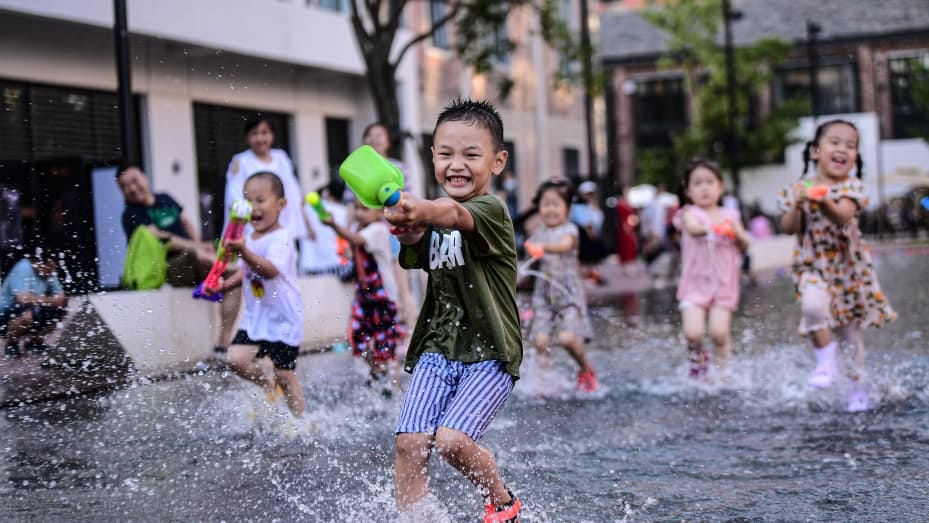 Children cool off in the water at a park as a heat wave hits the city on July 16, 2021 in Shenyang, Liaoning Province of China. Children cool off in the water at a park as a heat wave hits the city on July 16, 2021 in Shenyang, Liaoning Province of China.