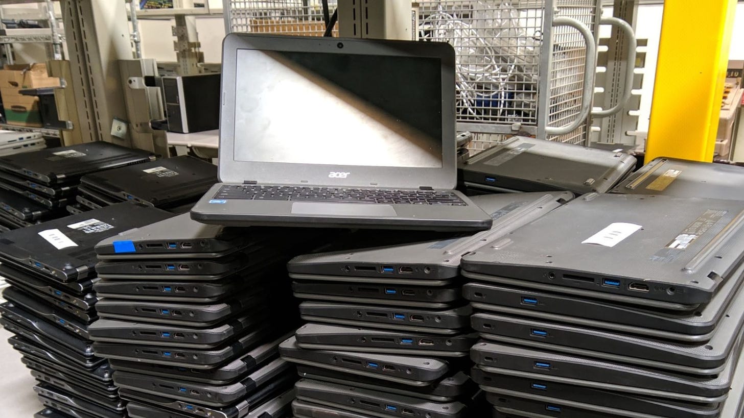 Chromebooks pile up as their expiration date is reached. (Photo courtesy of Peter Mui.)