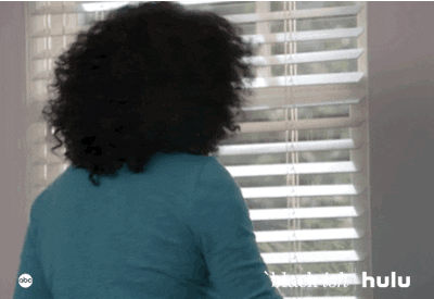 Tracee Ellis Ross on Blackish turning around and then putting her hands up to block her eyes.