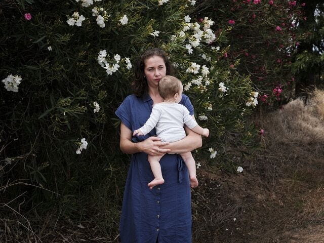Anastasia Condon with her baby at her sister-in-law’s home in Rutherglen, Victoria.