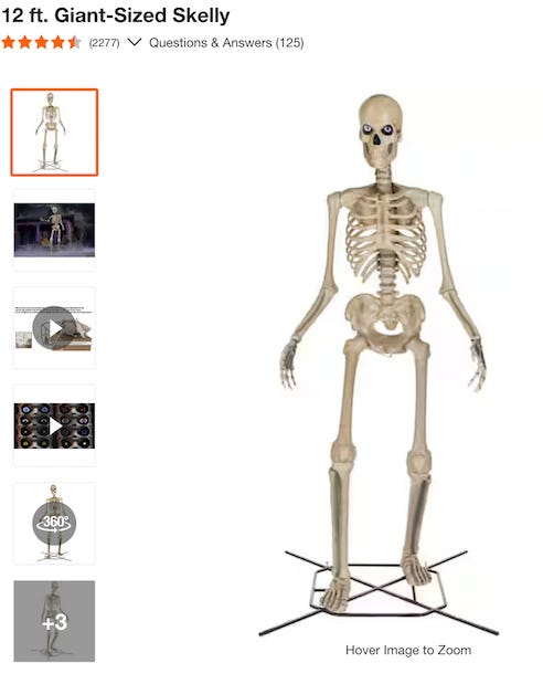 A product info picture from some kinda shoppin’ website with a picture a’ what they call “12 ft. Giant-Sized Skelly”. There’s an orange highlight around one a’ the preview images.