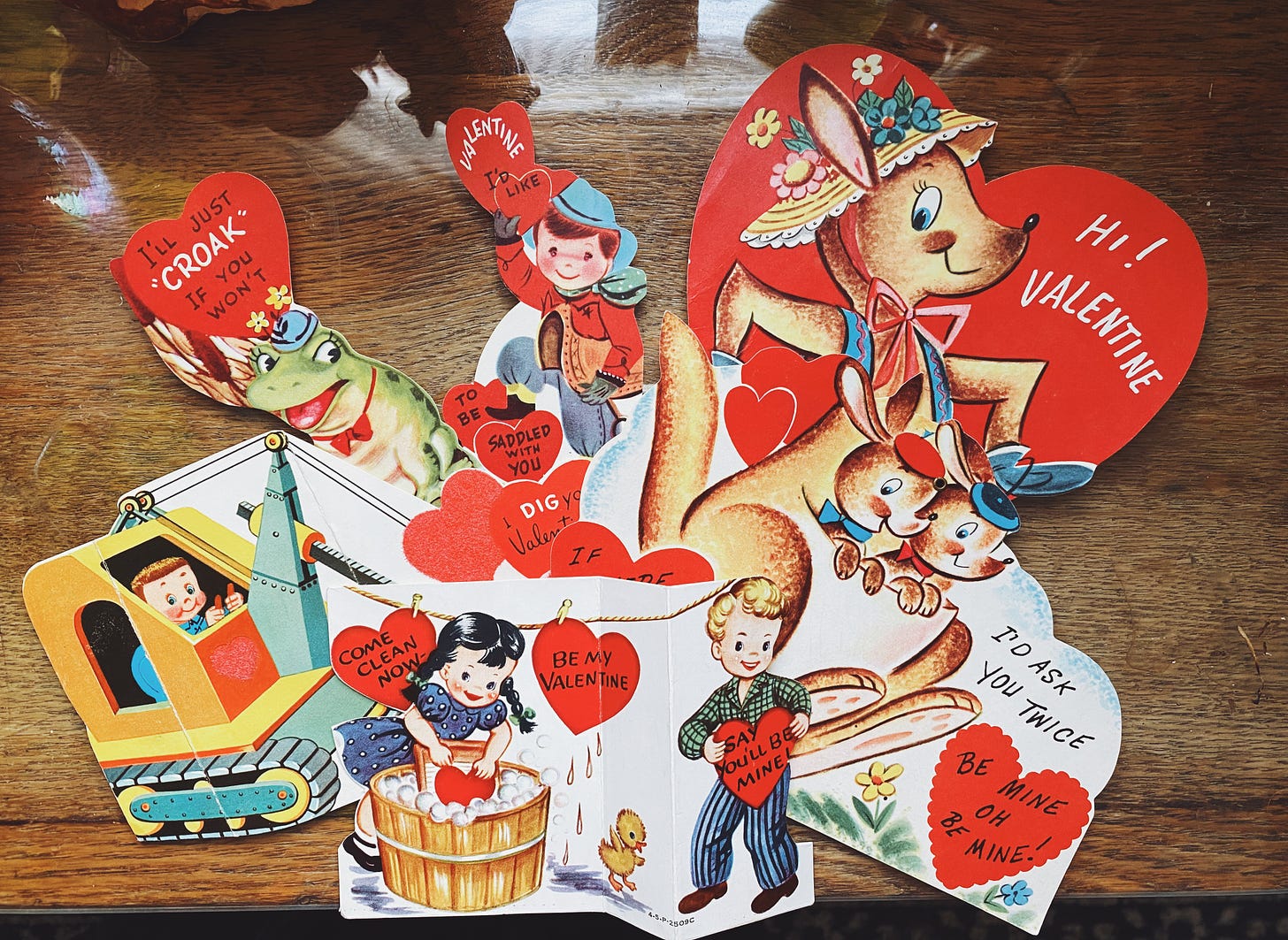 A collection of various retro Valentine Cards with cheesy greetings.