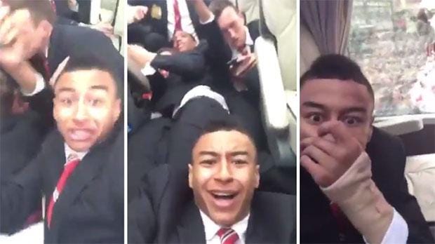 manchester united players react to fans attacking bus