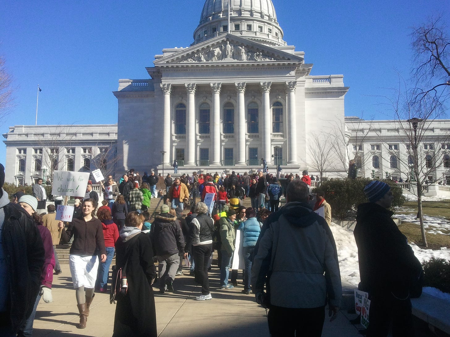Protesters gather outside the Capitol in Madison