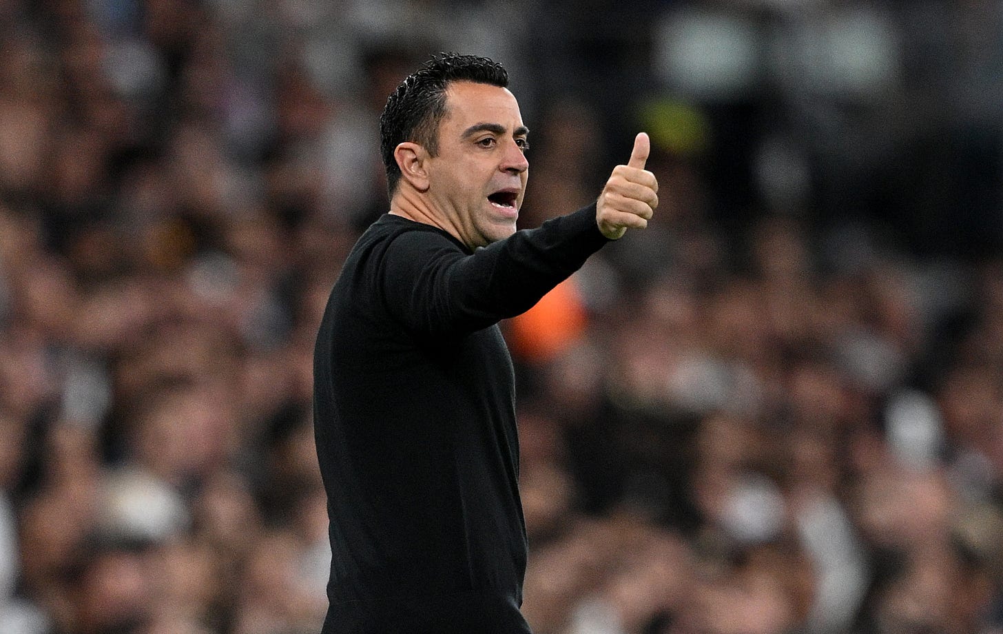 Barcelona boss Xavi Hernandez pictured with his thumb up
