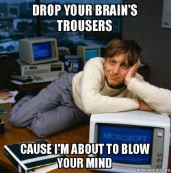 image of person laying on old-style computers with caption "drop your brain's trousers because I'm about to blow your mind"