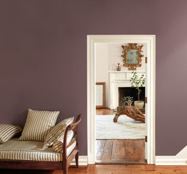 plum undertones on a feature wall complemented with a neutral white