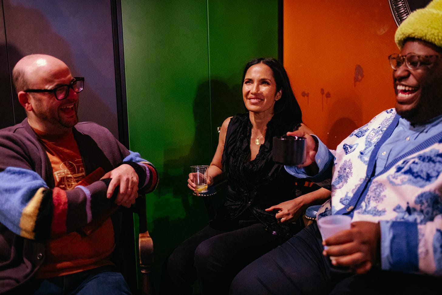 Me, Padma, and Larry Owens sitting backstage at the Bell House, smiling. 