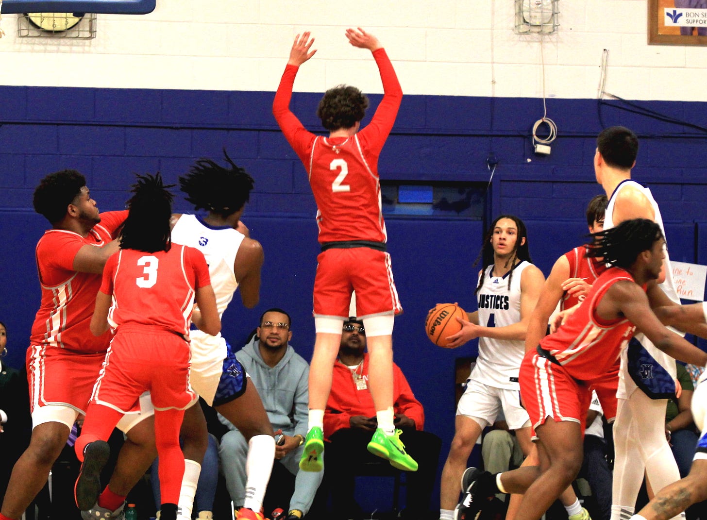 Dominique Bailey playing basketball at John Marshall HS