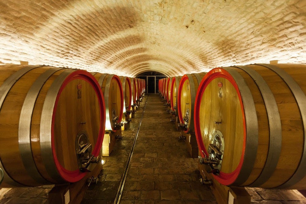 Buttload of wine - barrels of wine in a cellar