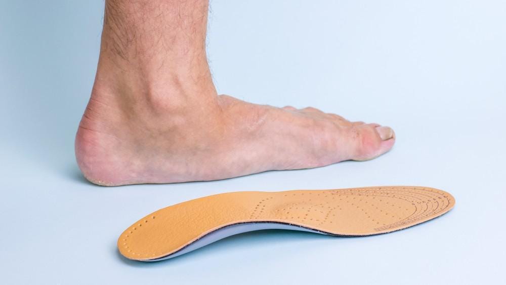 Bothered by Flat Feet? Custom Shoe Inserts Can Help: Francine Rhinehart,  DPM: General Podiatrist