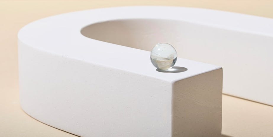 a close up of a white object on a table