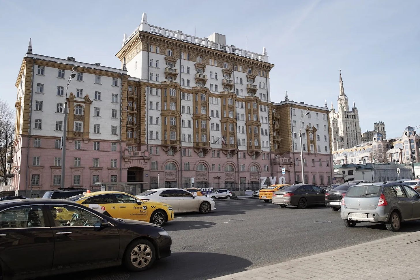 Cars ride past the U.S. Embassy in Moscow.
