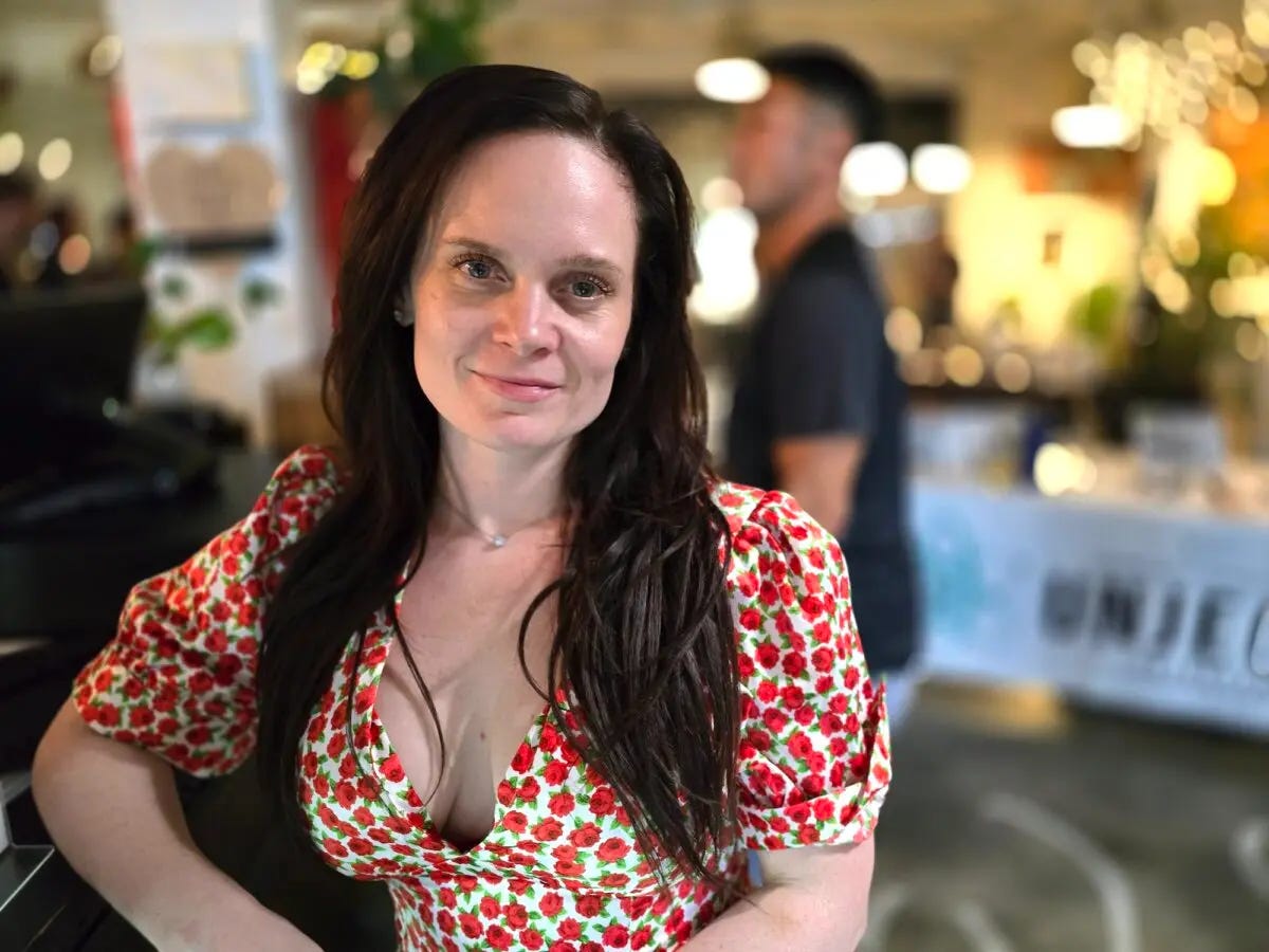 Courtney Furlong, 36, stands at the vegan bar during a social mixer for unvaccinated singles in Phoenix, Ariz., on July 15, 2024. (Allan Stein/The Epoch Times)