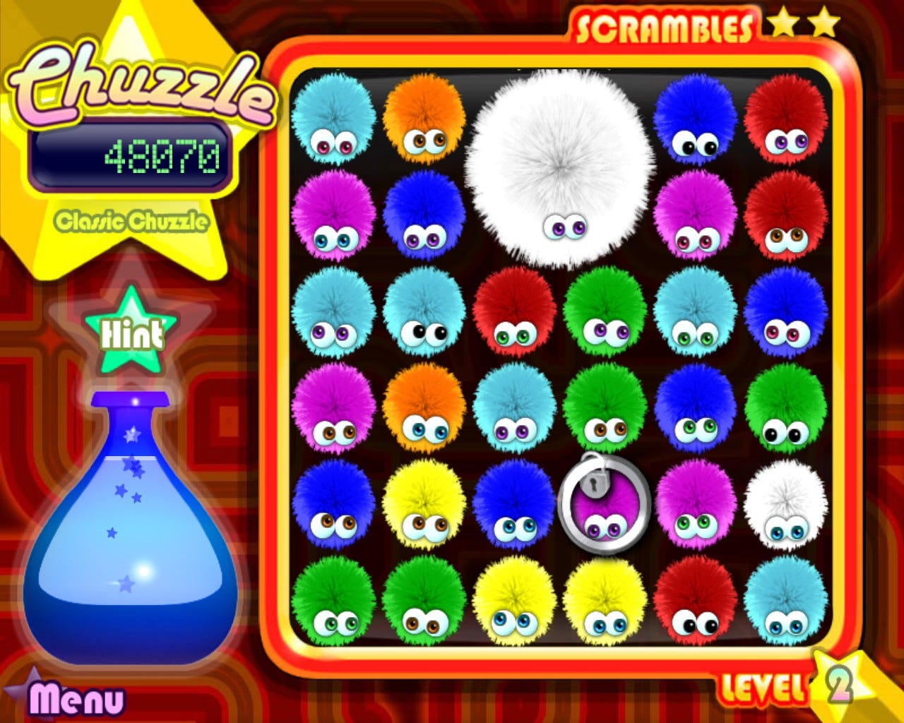 screenshot of Chuzzle, featuring numerous Chuzzles, fuzzy creatures with eyes