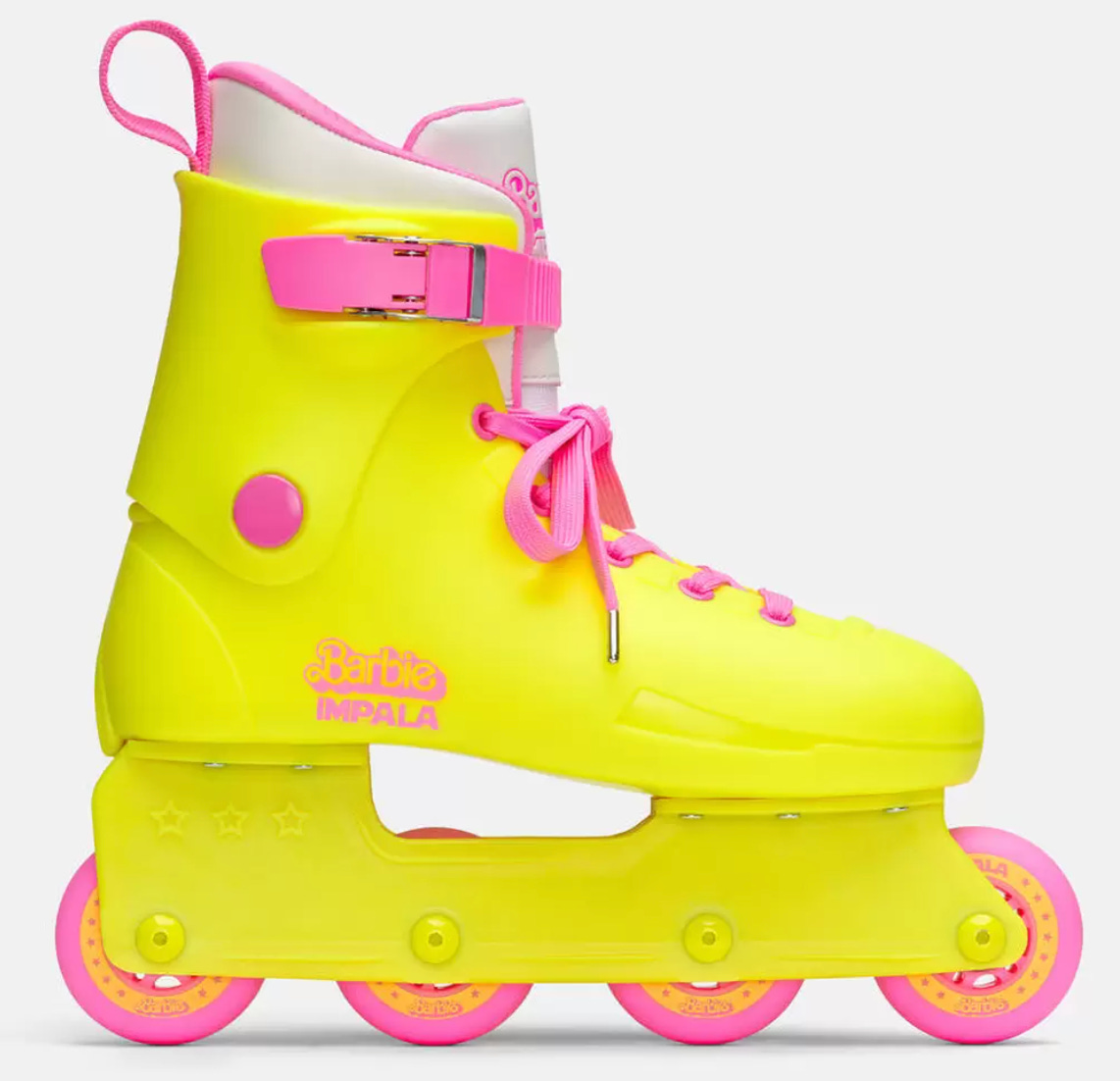 Neon yellow Barbie rollerblades from Impala, with pink laces and accents
