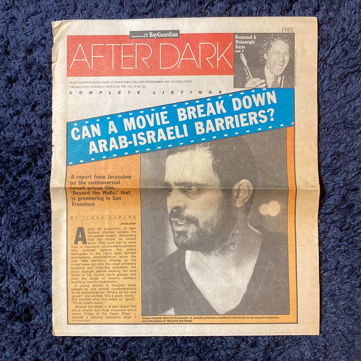 Page from the Bay Guardian newsweekly with headline saying "Can a movie break down Arab-Israeli barriers" and a photo fromn the movie Beyond the Walls
