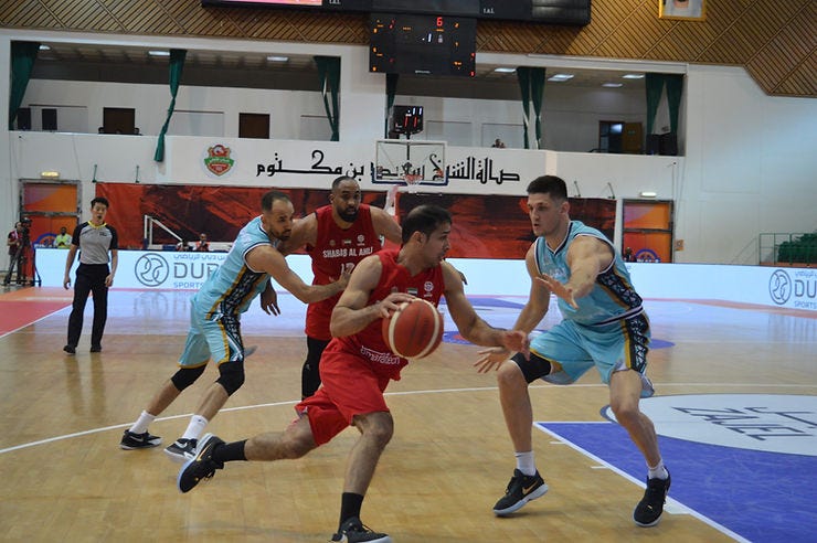 Saeed Al Ajmani driving to the basket