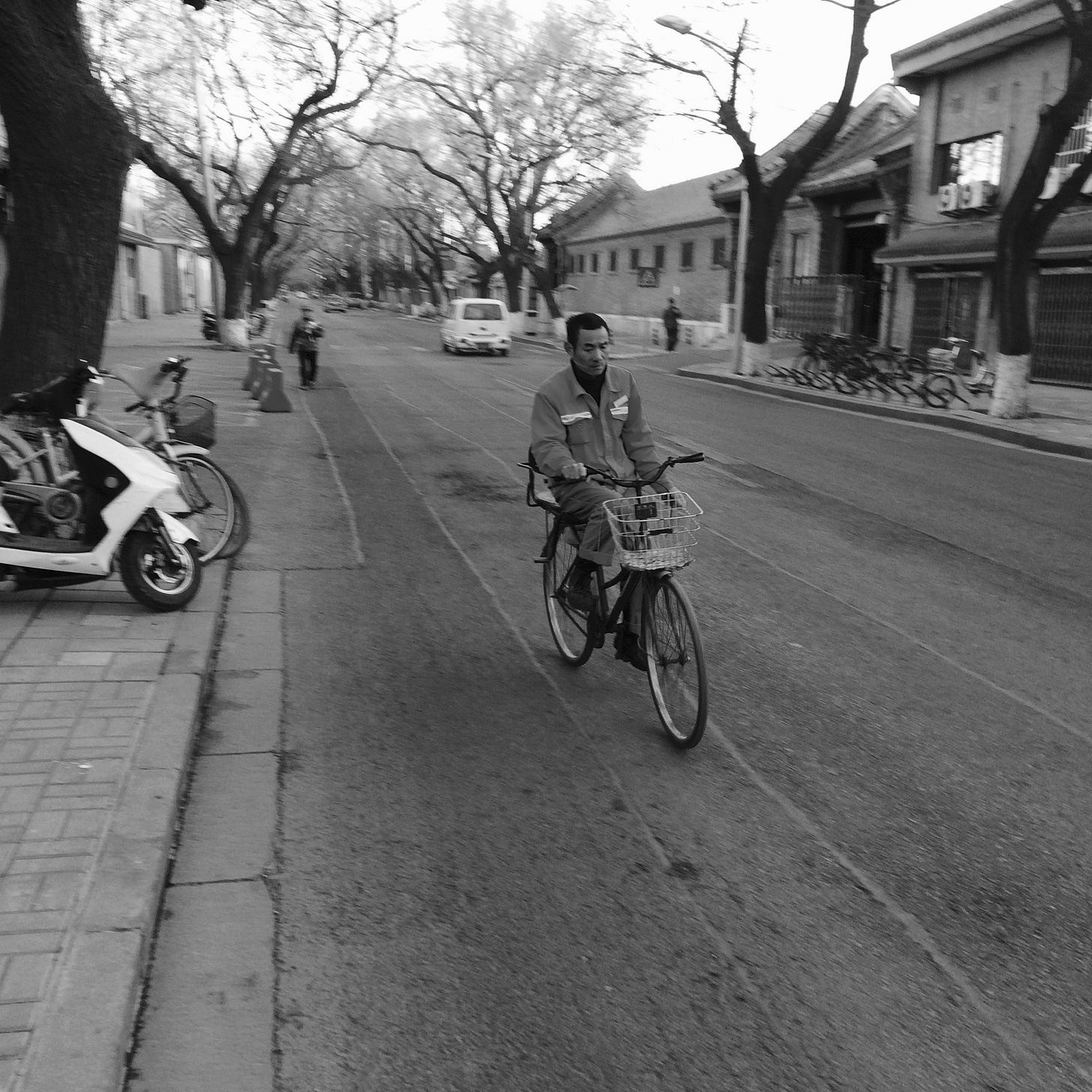 Man cycling in central Beijing.