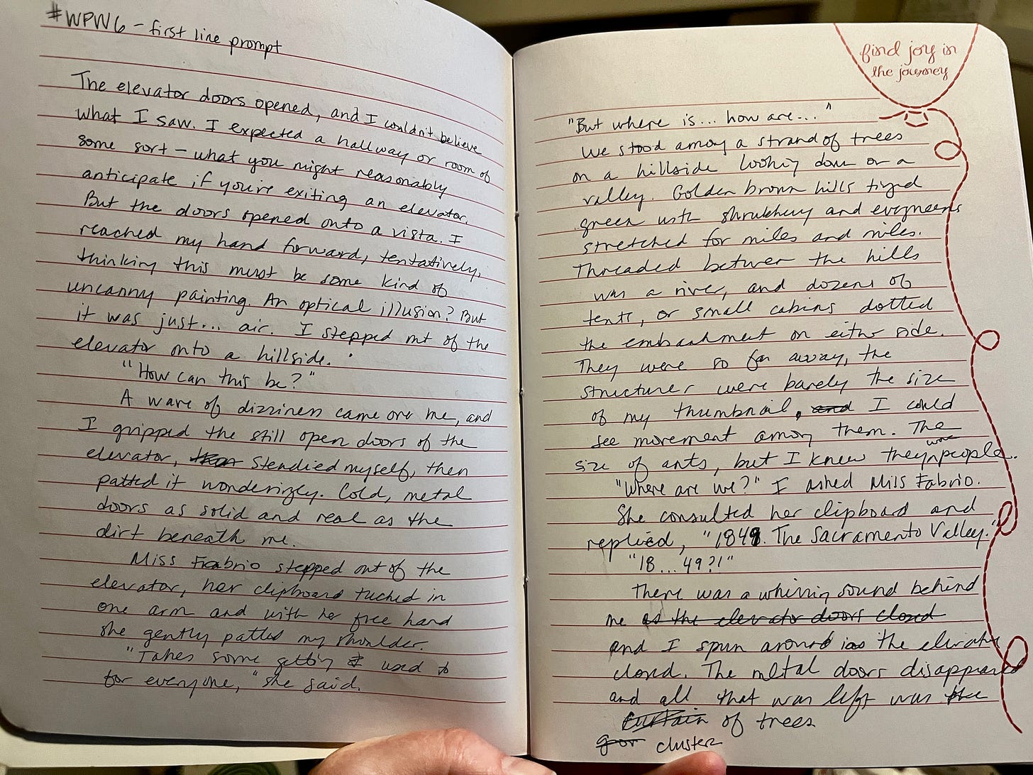 A paper journal with lined pages filled with handwriting. "Find joy in the journey" is printed at the top of the right page inside the outline of a balloon.