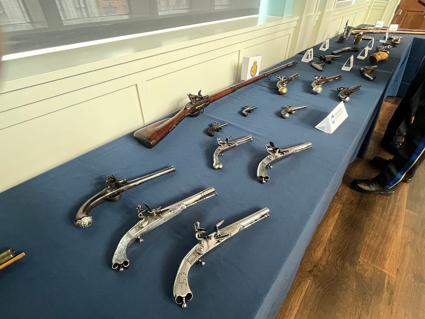 Some of the 50 firearms and other historical artifacts returned to representatives from 16 museums at a repatriation ceremony at the Museum of the American Revolution on March 13, 2023.