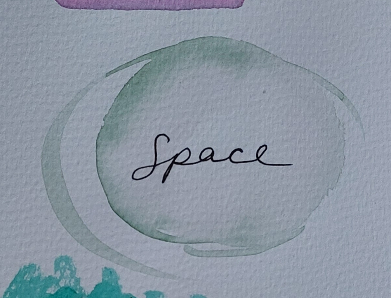 Space in a light green watercolour oval