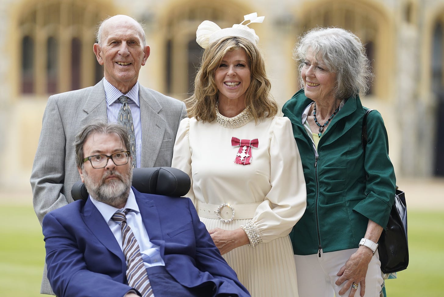 Kate Garraway, with her husband Derek Draper and her parents Gordon and Marilyn Garraway, after being made a Member of the Order of the British Empire for her services to broadcasting, journalism and charity by the Prince of Wales during an investiture ceremony at Windsor Castle, Berkshire. Picture date: Wednesday June 28, 2023.