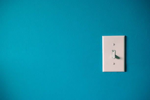 Hit the lights  wall light switch stock pictures, royalty-free photos & images