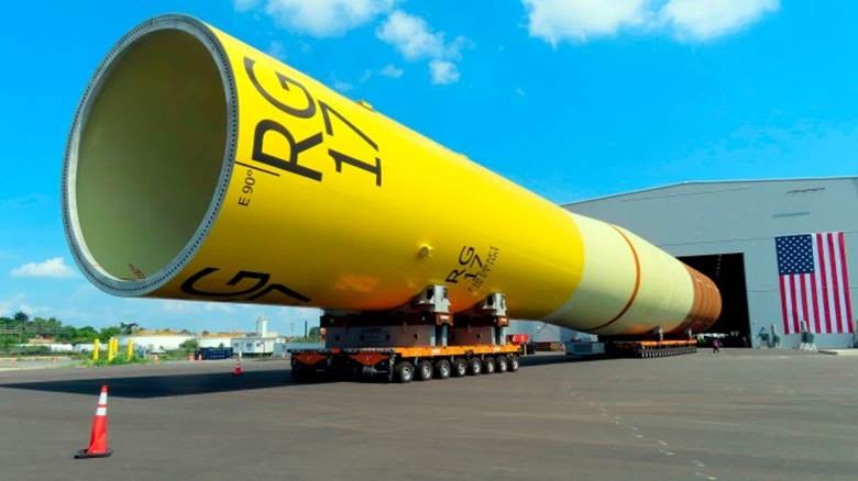 A foundation for an offshore wind turbine sits on top of wheeled movers