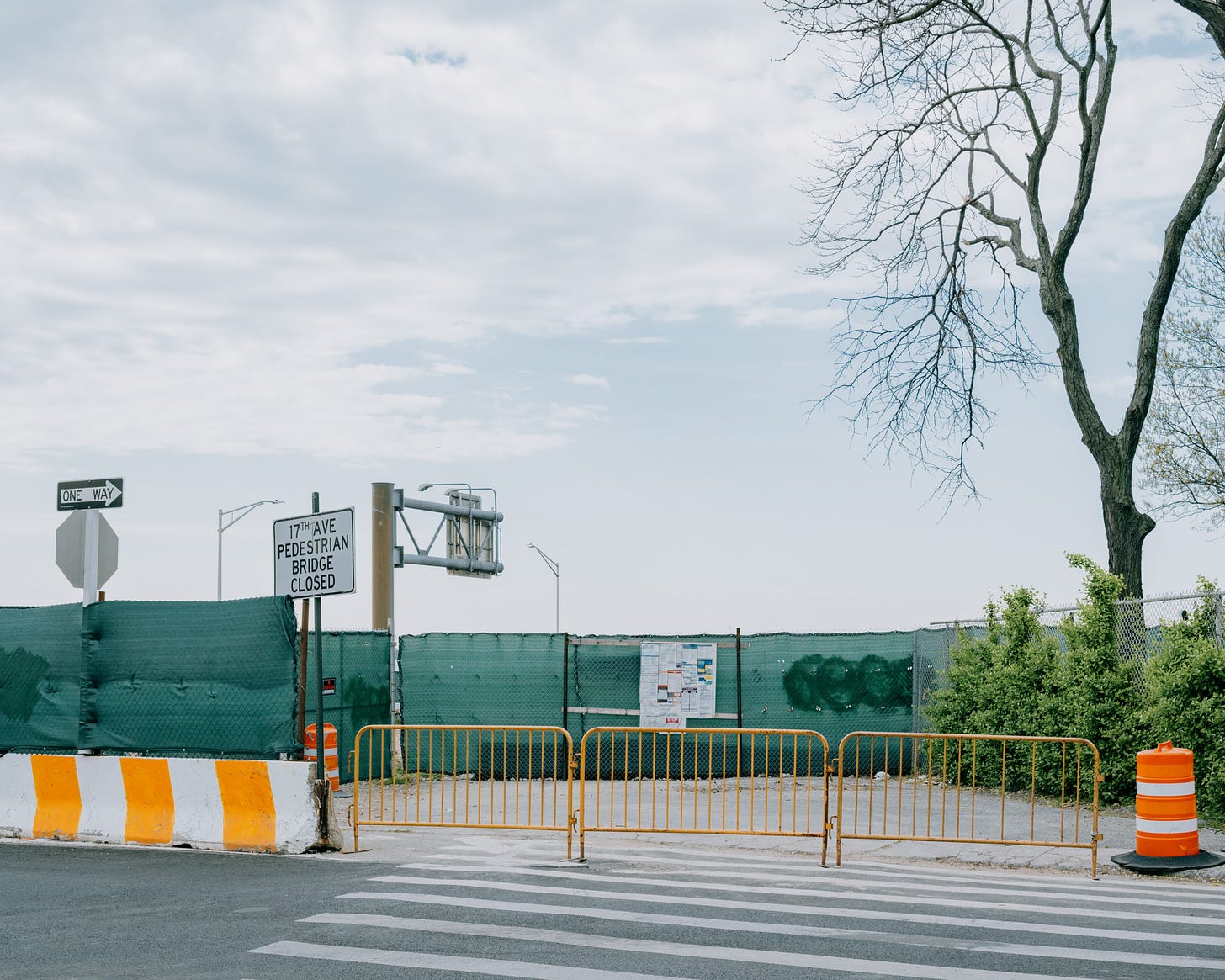 Orange-barricades-blocking-pedestrian-bridge