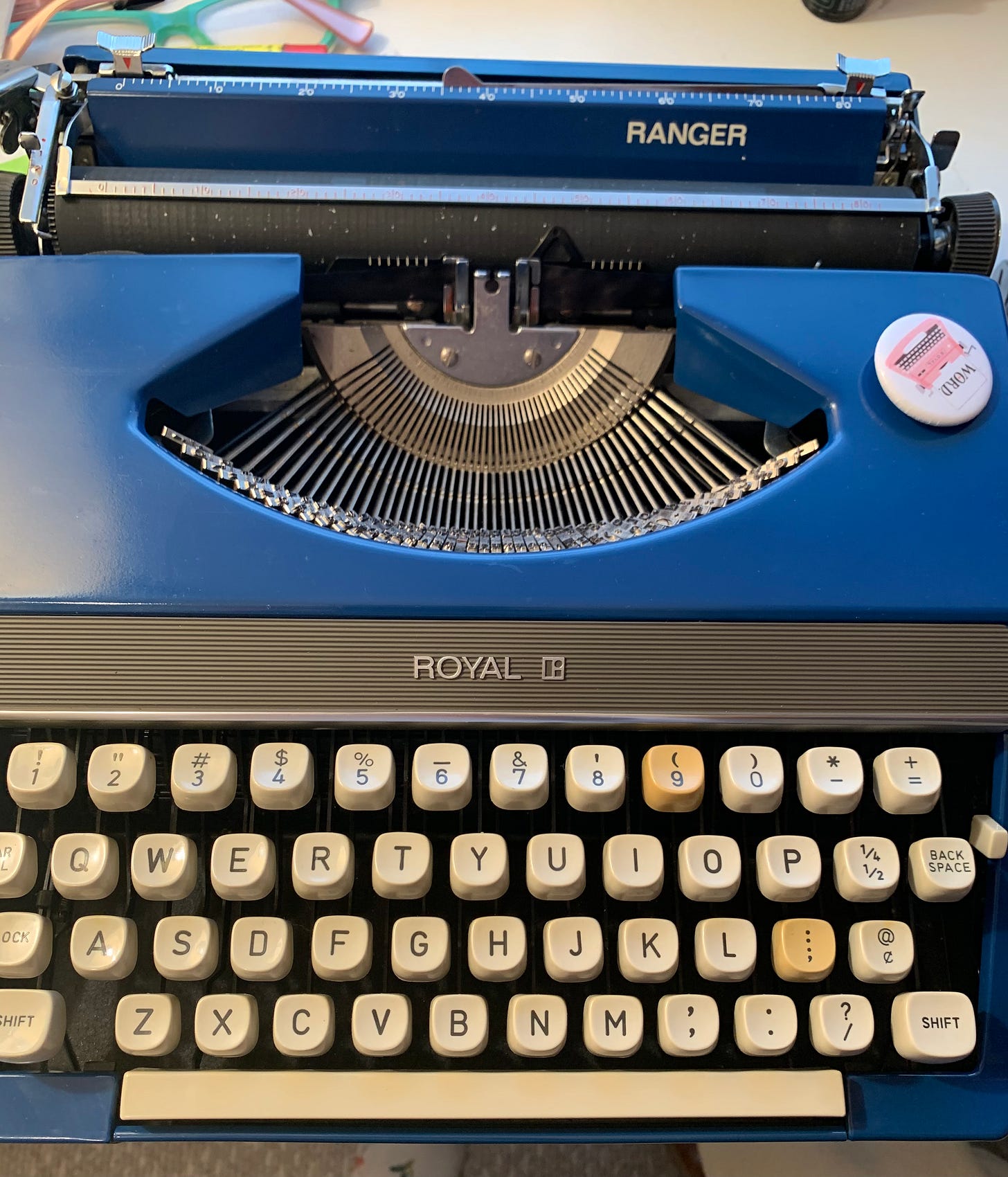 A close up of my 1975 Royal Sahara typewriter in deep blue