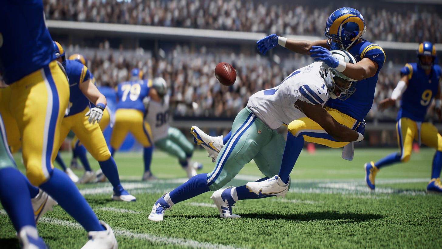 Video game screenshot of a football player tackling another one