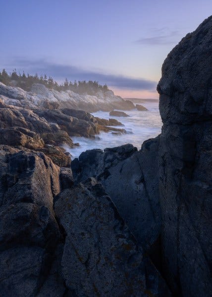 Predawn light reflects off of sky, land, and sea in Acadia National Park, Isle au Haut, Maine.