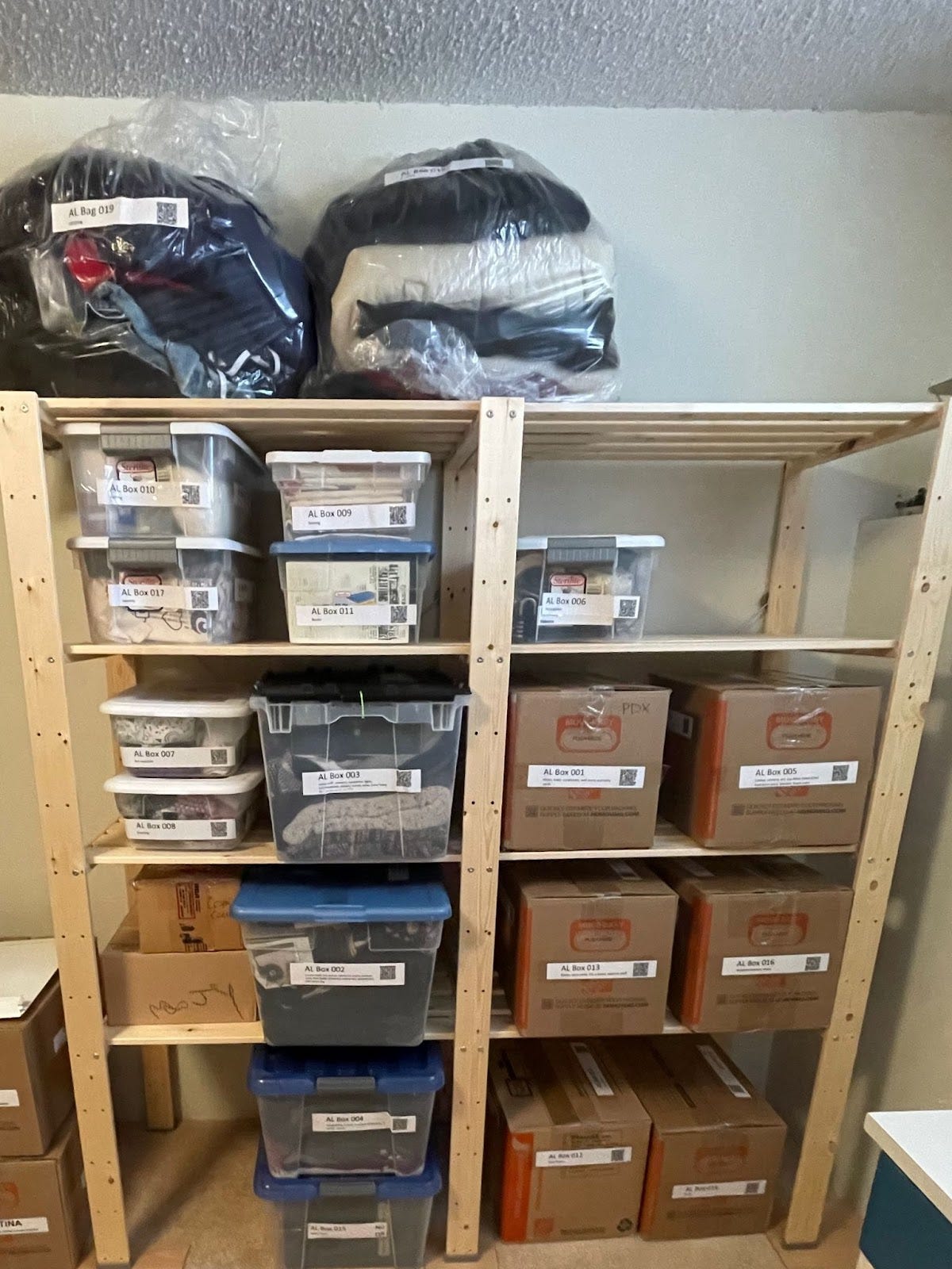 Photo of a shelf with our younger daughter's stuff